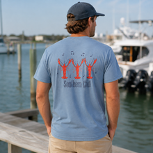 Load image into Gallery viewer, Crawfish Jam tee lifestyle at the marina
